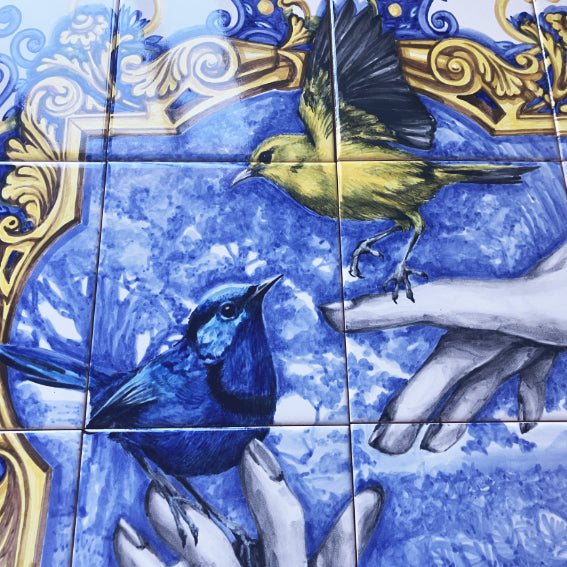 Hand painted tile mural "Dreamers". A Set of 16 glazed ceramic tiles.