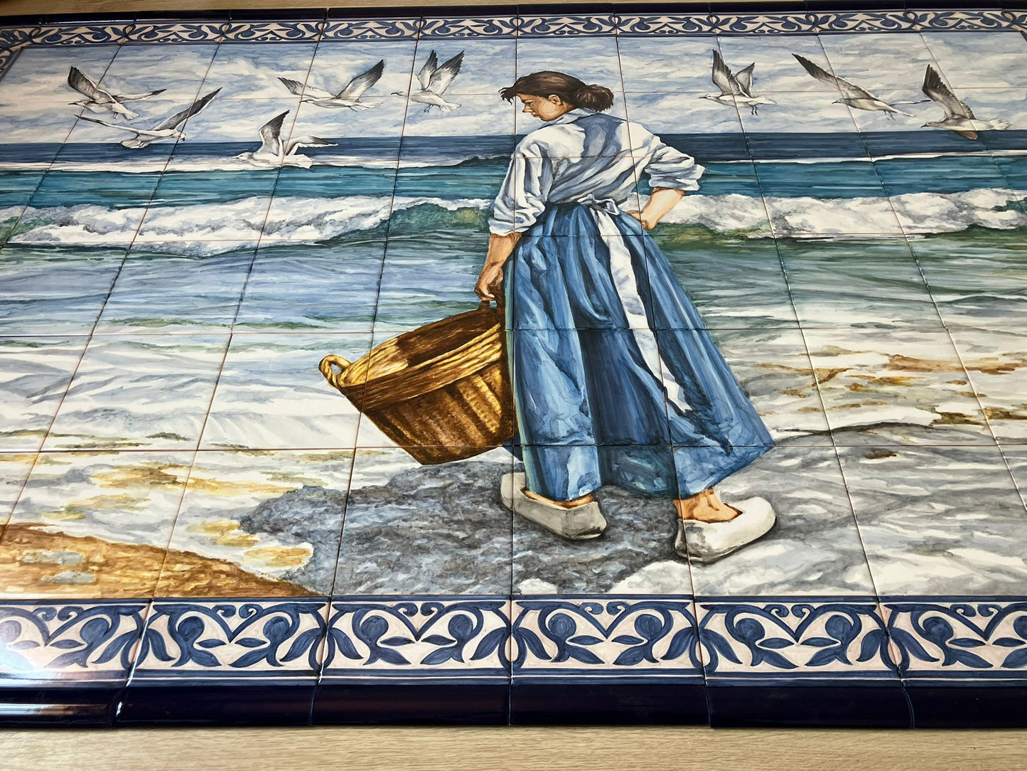 Hand painted tile mural "Lady by the sea". A Set of 104 glazed ceramic tiles.